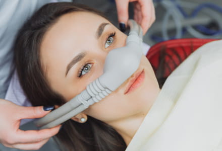 Dentist McKinney Dr. Kim administering sedation for patient comfort at Pecan Tree Family Dentistry