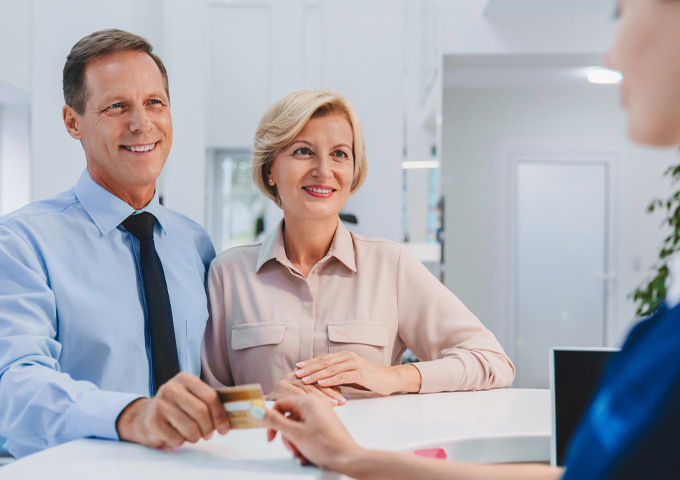 Pecan Tree Family Dentistry Wellness Plan benefits chart showing savings on preventive care and treatments